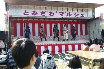 <p>The Squad will turn up to events big and small, such as this market</p>