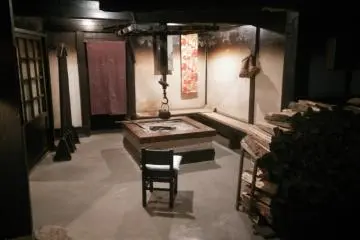 <p>The fireplace in the courtyard just inside the front gate</p>