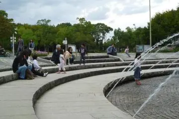 Kids playing by the fountain