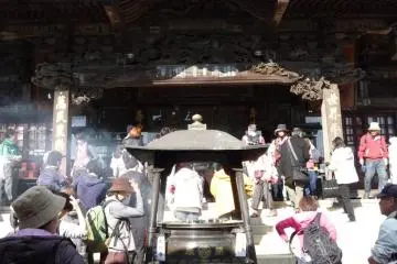 This is one of various temples where people come to offer prayers and requests.  It was crowded on the day we went.