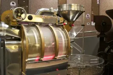 <p>A roasting machine</p>