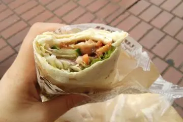 <p>The kebab wrap, available to take out with a choice of sauce</p>