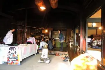 <p>Inside Furusato-no Ie, local people were enjoying chatting and eating</p>