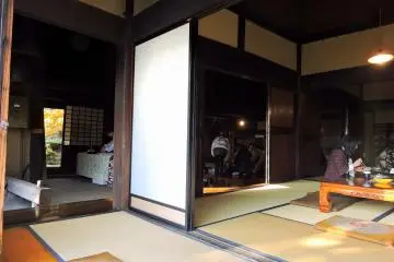 <p>Spacious tatami-mat Japanese rooms inside Furusato-no Ie</p>