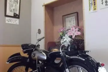 A motorbike at the entrance, which I can't explain