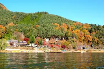 <p>A view of Tozawa Center from Lake Kawaguchiko</p>