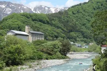 Heading down the Tone River with Mount Tanigawa looming over