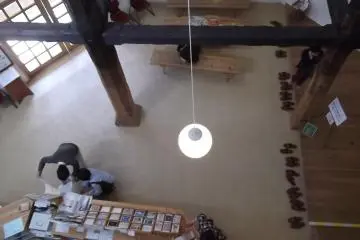 <p>Looking down on the hall from the second floor</p>