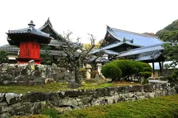 Impressive stone garden with brilliant red Rokkaku-do Hall (Hexagonal Hall)