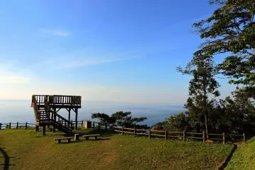 Echizen Cape Observation Deck on the hilltop, and the Japan Sea stretching away under the blue sky