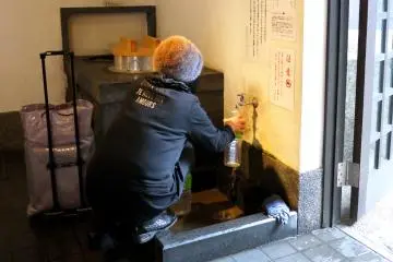 <p>Local people still fill water bottles at the spring here</p>