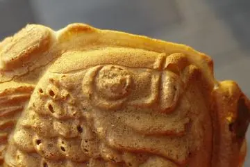 Taiyaki are a little like waffles, and come filled with sweet bean past or custard. Tai is the Japanese word for sea bream.