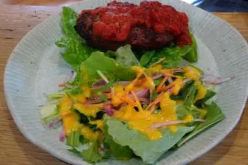 <p>Delicious venison steak topped with tomato sauce&nbsp;</p>
