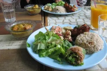 Curry with side dish platter.