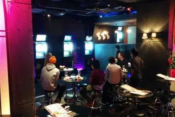 <p>This back wall of dart machines creates a perfect lounge area</p>