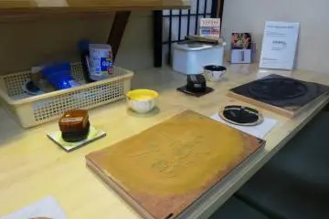 <p>A carved block used in the printing process</p>