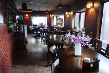<p>The communal dining area, where breakfast is served daily</p>