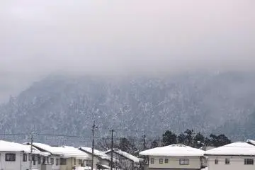 <p>Misty snow-covered mountain</p>