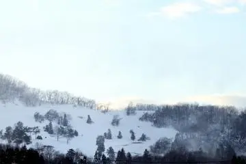 <p>Snow-covered mountain in a rare sunshine</p>