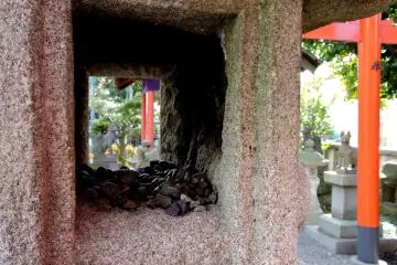 <p>Small stones inside one of the lanterns</p>