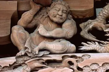 <p>One of the carved strongmen supporting the roof</p>