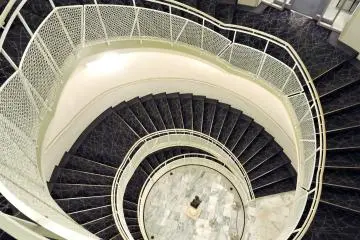 From the Japanese Garden, you enter the Prince Sakura Tower Tokyo and climb this winding staircase to the third floor where Shichiken-Jaya is located.