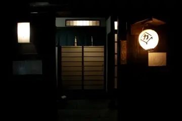 <p>Finally, we located a restaurant with a simple name, Kado, that seemed more-or-less welcoming, with a menu being displayed outside and the door not being shut-dead.</p>