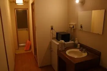 <p>In the hotel room</p>