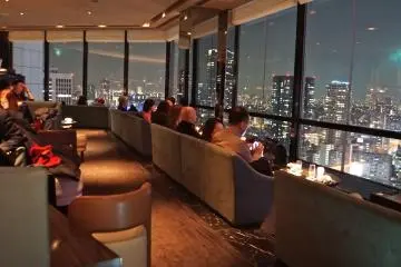<p>The lounge is composed of three, tiered sections of seating. The first two rows are shown here.</p>