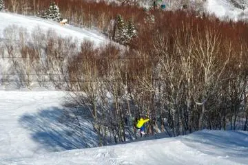 <p>A boarder takes the first set of jumps</p>