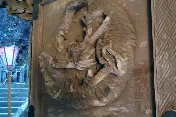 <p>One of the carved dragons on the doors of the 'two dragons gate'</p>