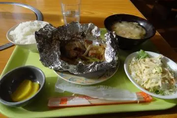 Lunch of baked salmon, rice and miso soup.