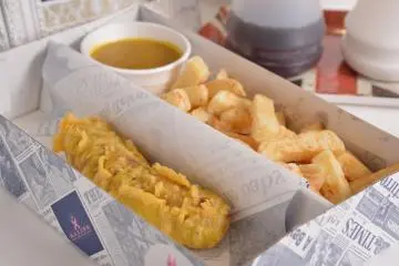 <p>Chips and buttered&nbsp;sausage</p>