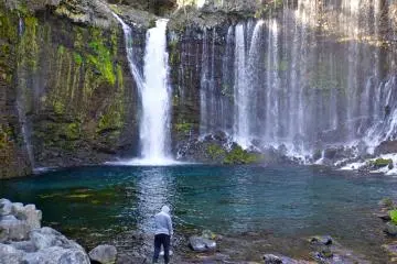 <p>Let the powerful cascade move you while enjoying the view at the base of Shiraito Falls</p>