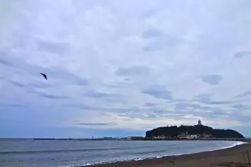 Dynamic skies often cover the port and the island.