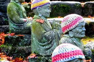 <p>A few of the statues lining the path</p>