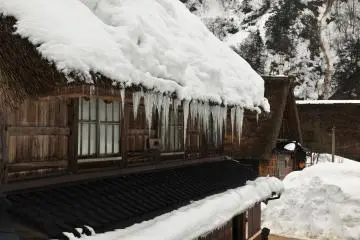 <p>Icicle art was hanging from the eaves of each house</p>
