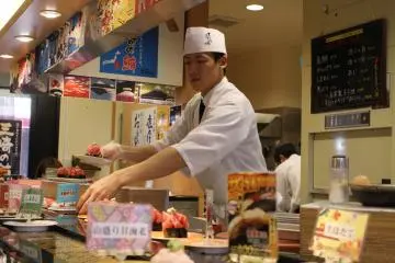 <p>One of several chefs serving up dishes for the rotation</p>