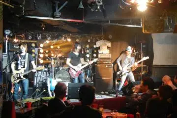 <p>The energy level inside the live house builds more and more as one famous song after another is performed</p>