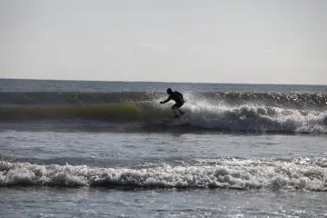 <p>One of the many surfers</p>