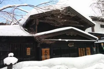 Snow buries the front entrance to this store