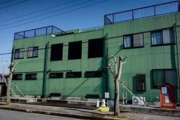 <p>The exterior of the sumo school</p>