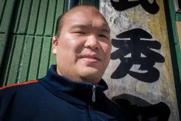 <p>Hidetoshi Kitazakura, the school's coach and popular 20 year sumo veteran.</p>