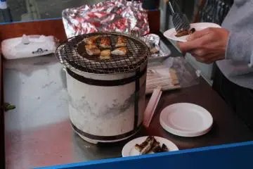<p>Tasting a few of the fish before I purchase</p>