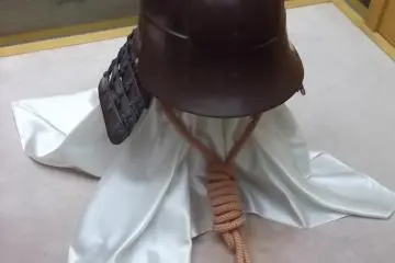 <p>A helmet on display</p>