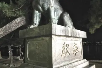 <p>One of a pair of lion guardians to the shrine</p>