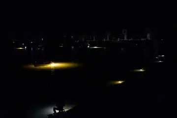 <p>Fishermen even gather on the riverbank to illuminate the course of the river (Kyuyoshino River)</p>