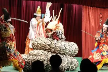 <p>One of the demons turned into a serpent during the battle but a priest comes to aid the heroes</p>