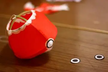 <p>The first step to making a goldfish lantern - sticking on the eyes!</p>