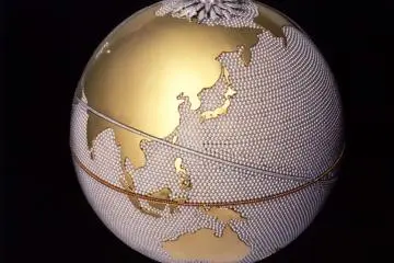 <p>A globe with land of 24 carat gold and a sea of pearls</p>